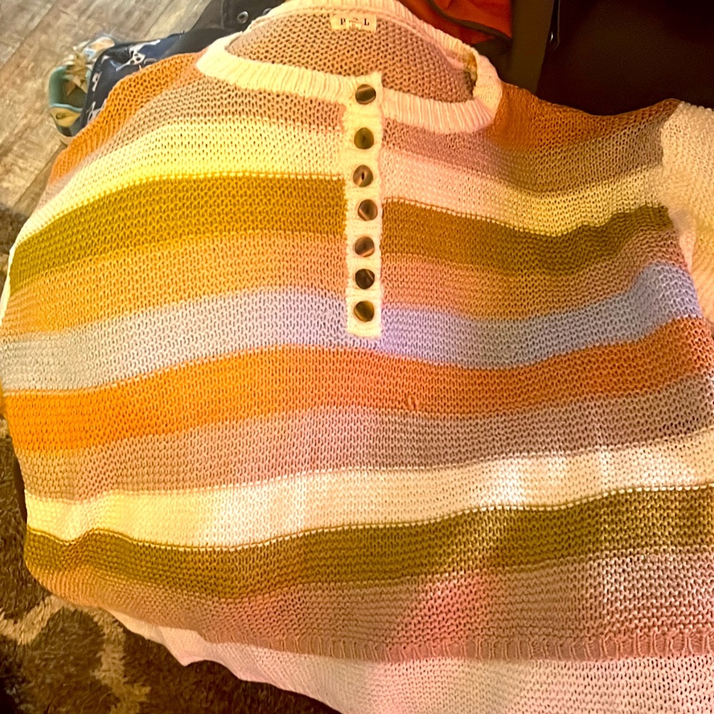 Very cute sweater!! Can wear in the winter or summer!